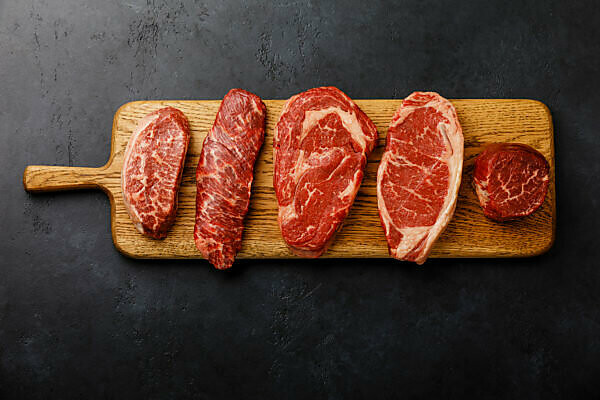 Pork Neck raw meat piece on wooden cutting board. wooden background. Top  view Stock Photo by composter-box