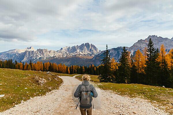 Alto Adige, teenage girl hiking on a path stock photo